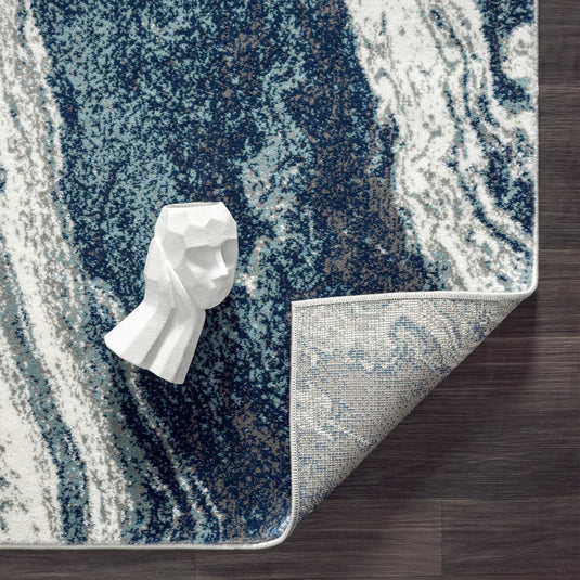 abstract-wavy-swirl-blue-area-rug