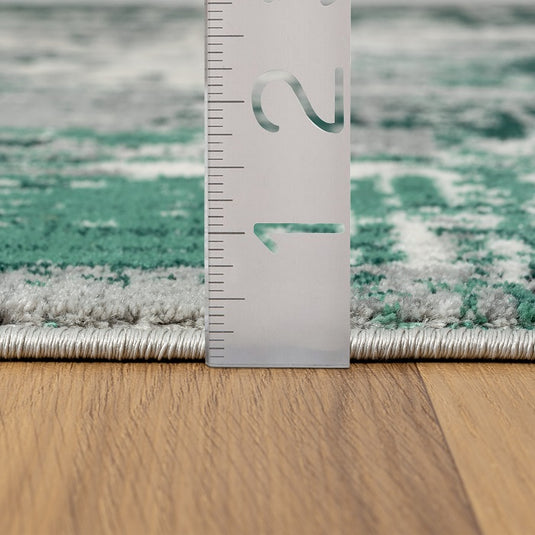 abstract-distressed-green-area-rug