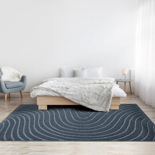 blue-bedroom-geometric-rug