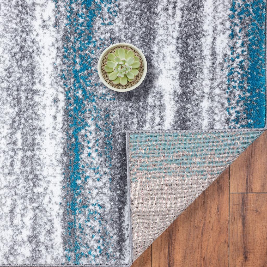 Modern-abstract-area-rug-turquoise