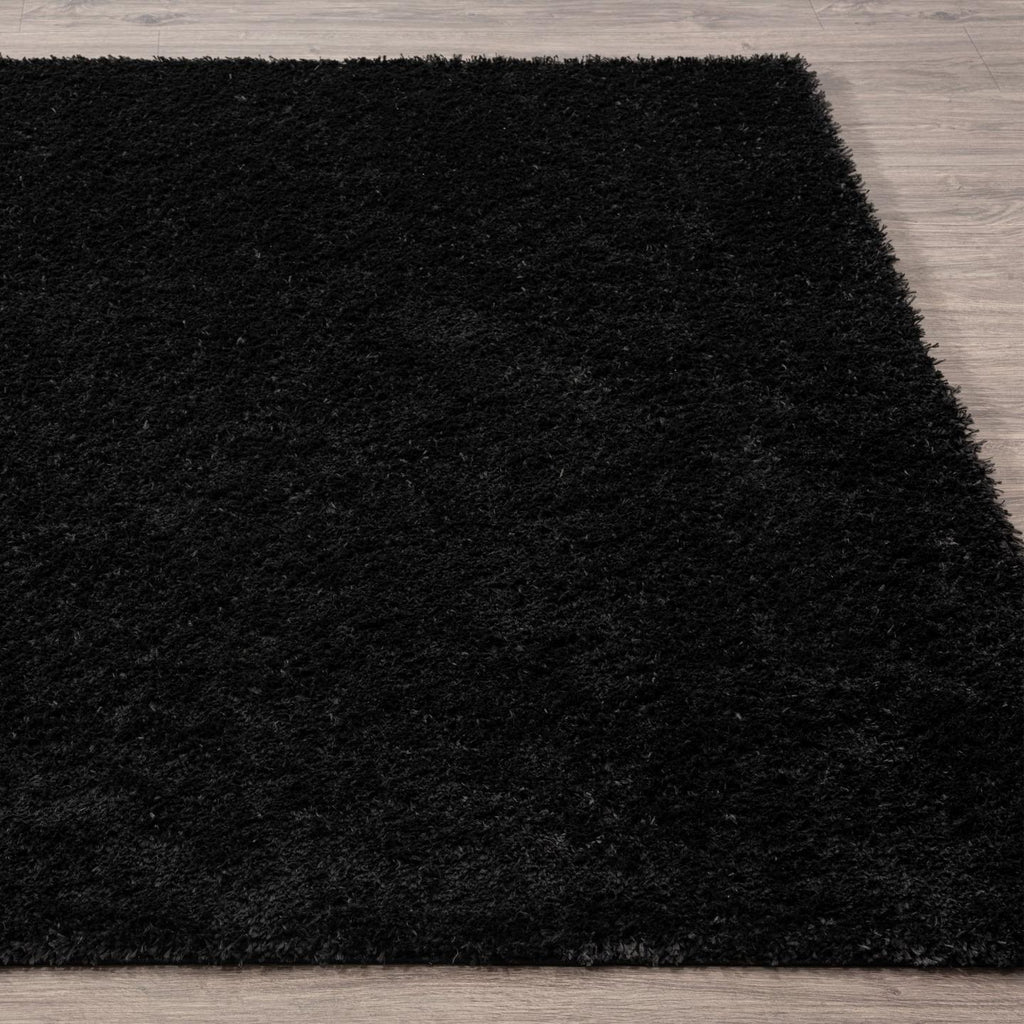 Black-plush-rug