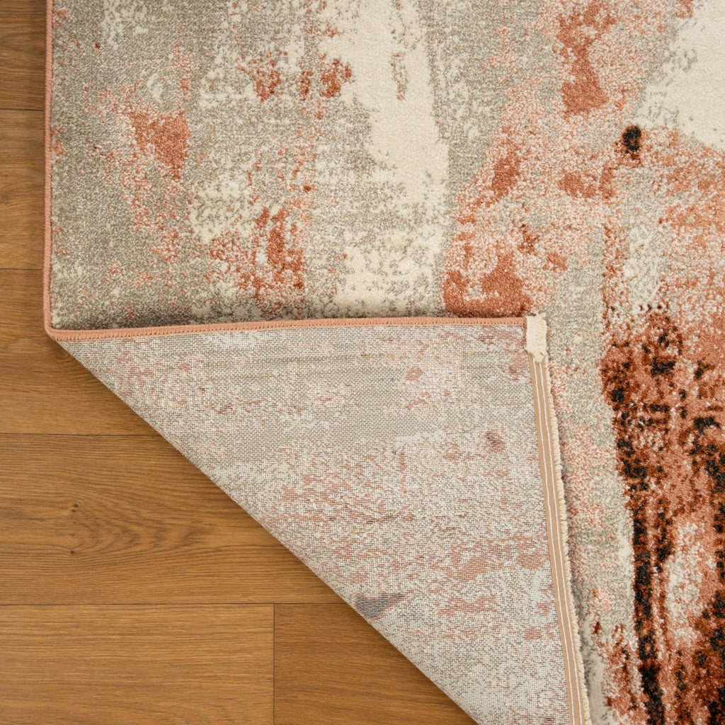 pink-abstract-fringe-area-rug
