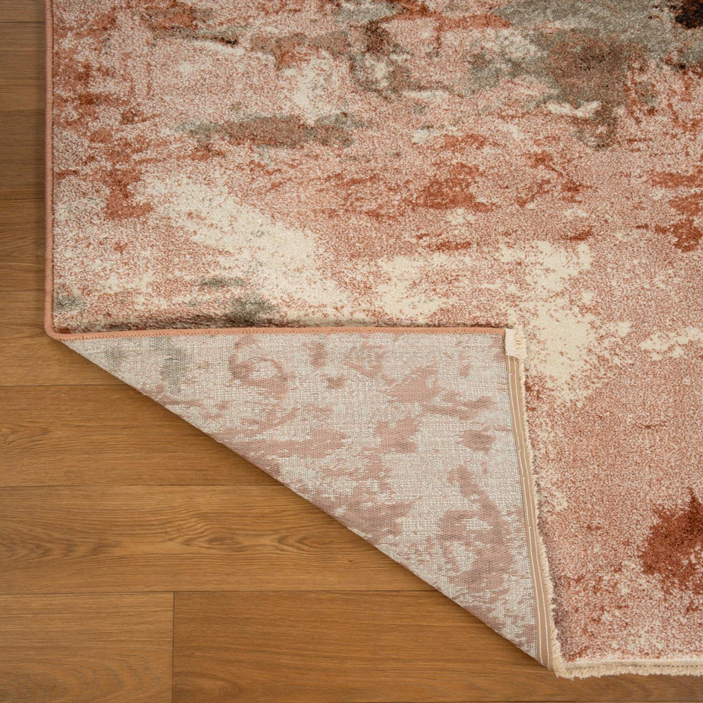 pink-fringe-abstract-area-rug